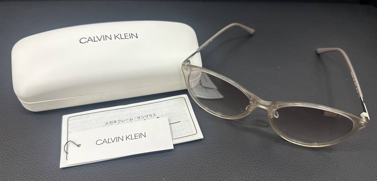 **4348 Calvin Klein Calvin Klein солнцезащитные очки CK19551SA светло-серый градация не использовался хранение товар **