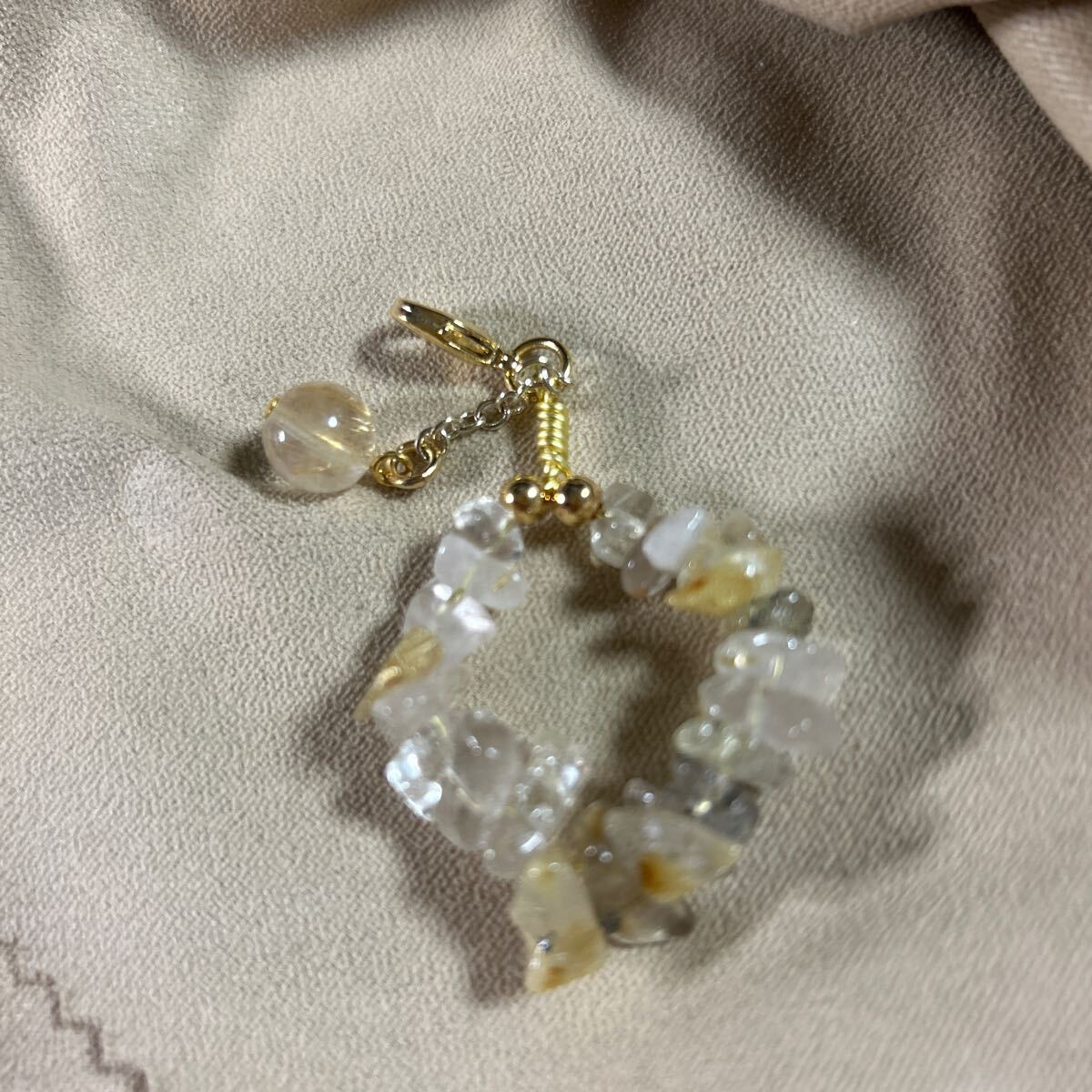  Gold rutile quartz 8 millimeter . small stone. strap 