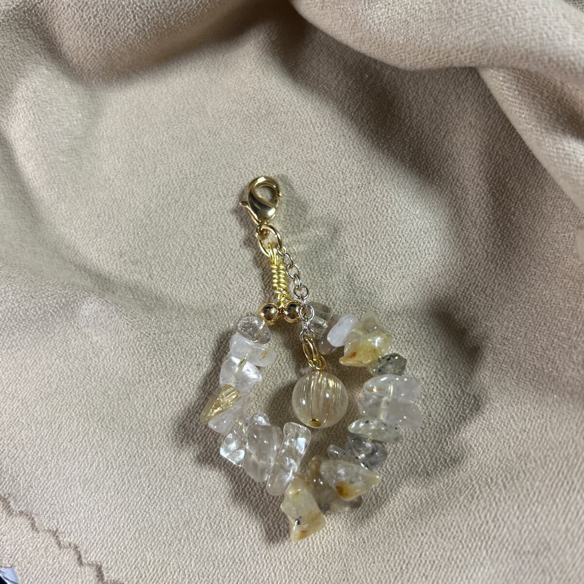  Gold rutile quartz 8 millimeter . small stone. strap 