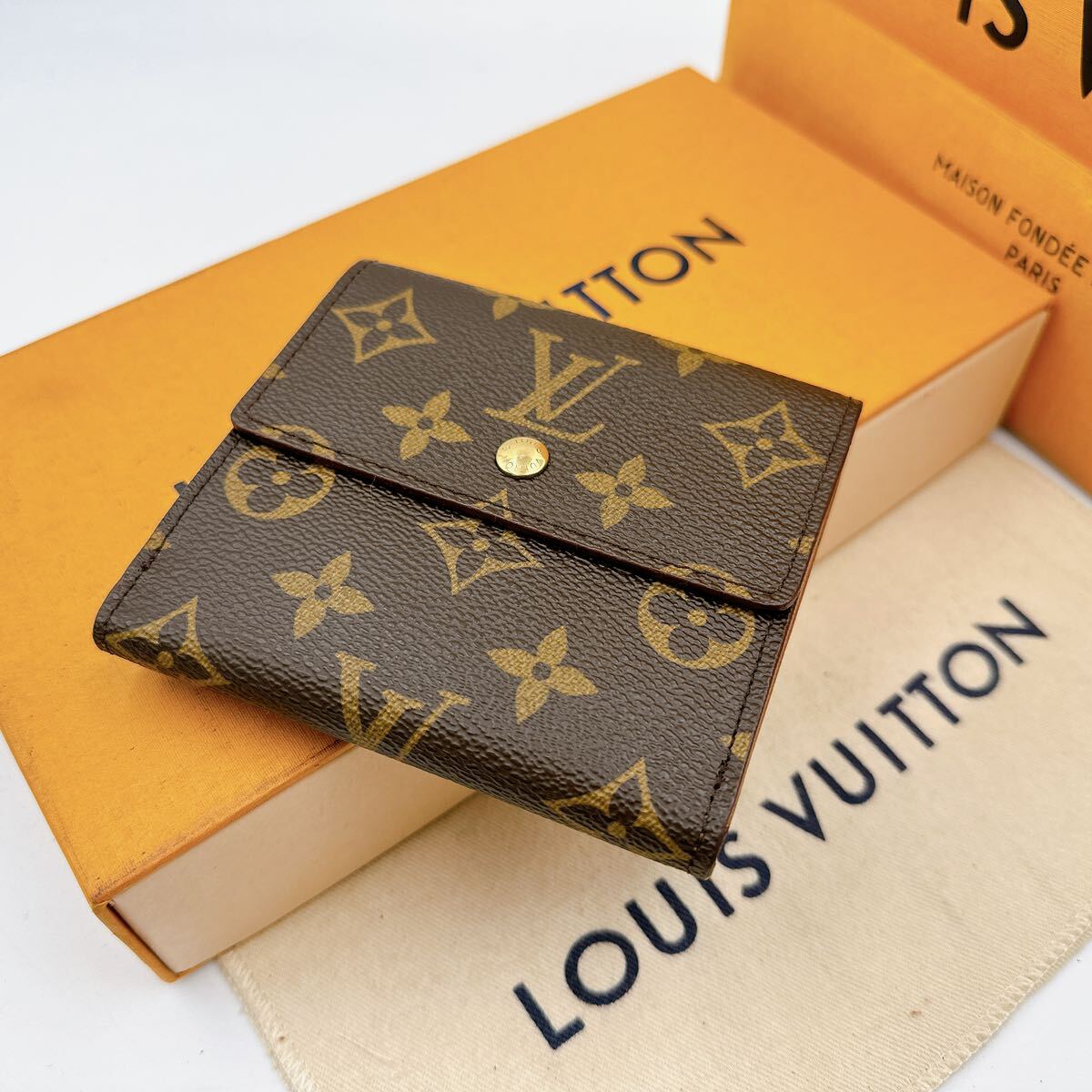 2820【未使用保管品】LOUIS VUITTON ルイヴィトン モノグラム ポルトフォイユエリーズ 三つ折り財布 Wホック ウォレット M61654/TH1925_画像1