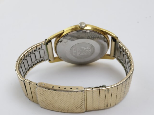 2404-683 テクノス オートマチック 腕時計 ゴールドシールド 25石 日付 金色の画像7