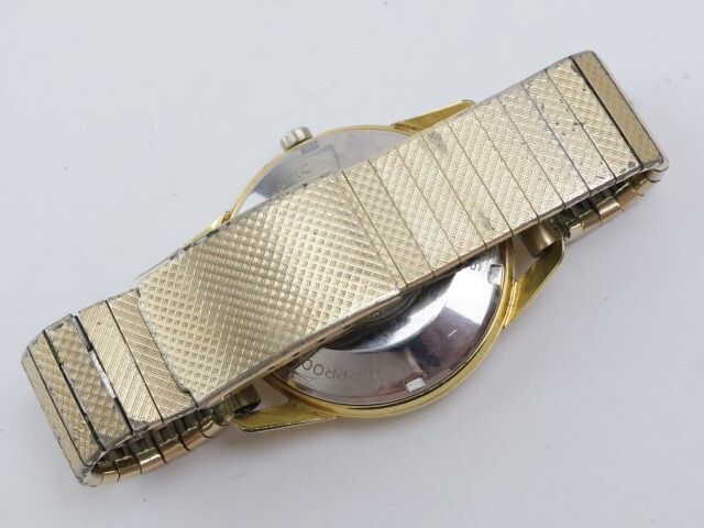 2404-683 テクノス オートマチック 腕時計 ゴールドシールド 25石 日付 金色の画像4