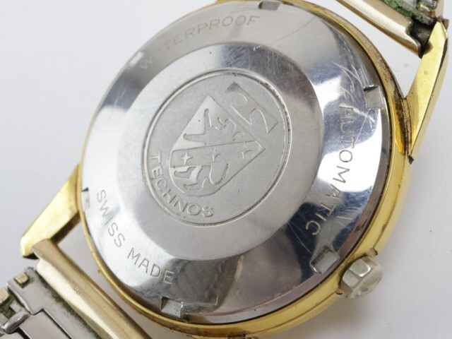 2404-683 テクノス オートマチック 腕時計 ゴールドシールド 25石 日付 金色の画像6