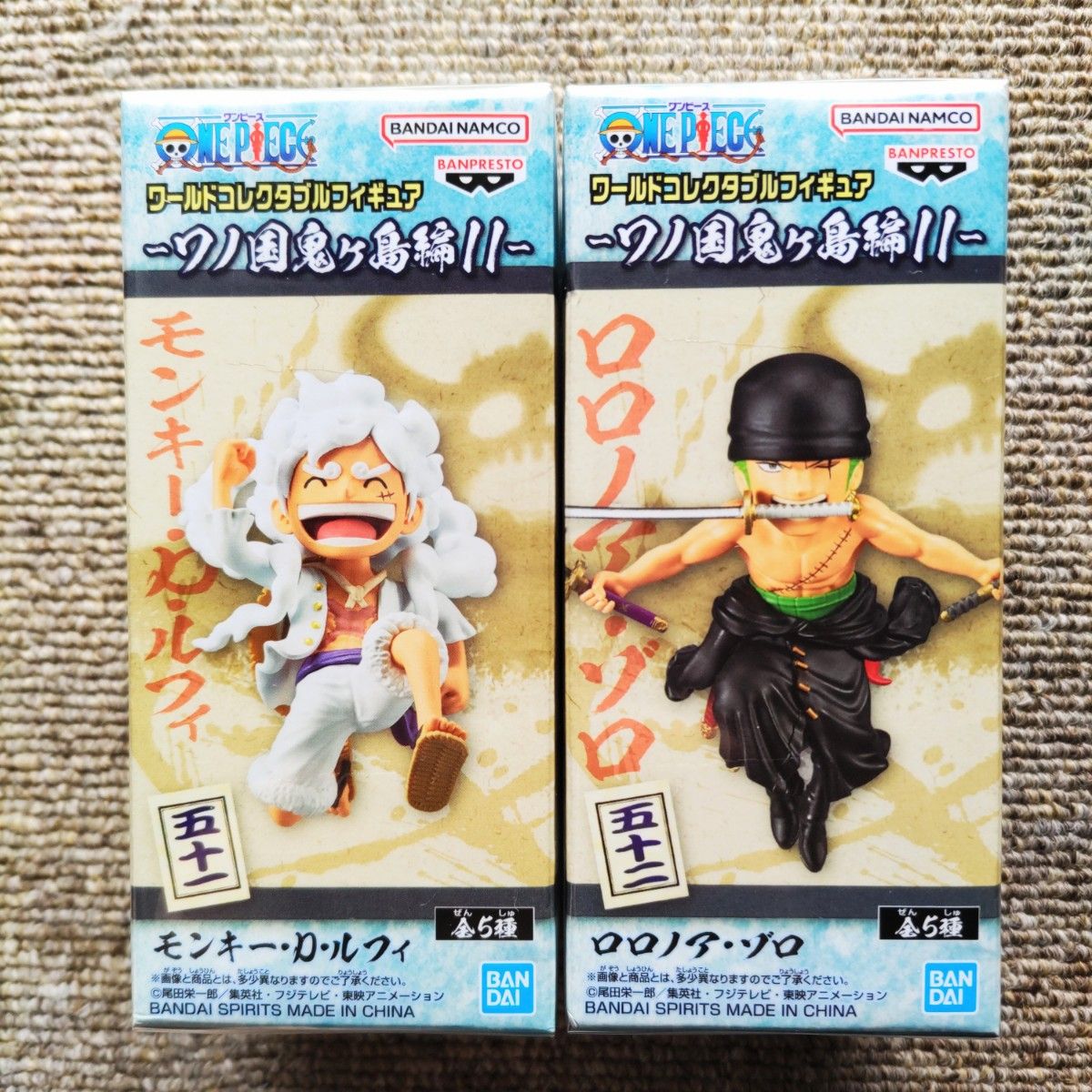 【新品】ワンピース　ワールドコレクタブル　鬼ヶ島　vol.11　ギア５ルフィ（ニカ） & ロロノア・ゾロ（2種セット）