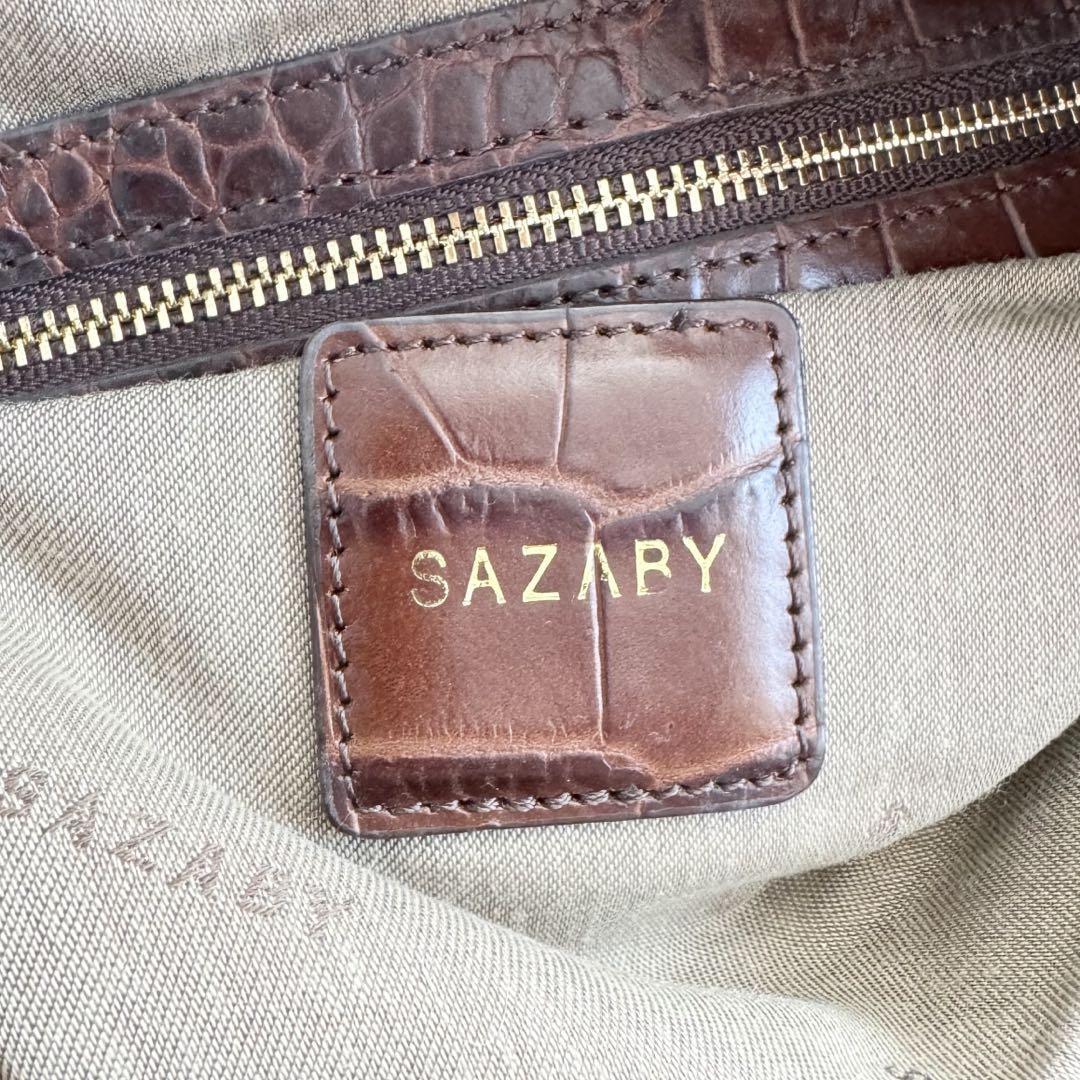  большая вместимость прекрасный товар A4 место хранения SAZABY Sazaby черный ko type вдавлено сумка на плечо большая сумка Brown мужской женский бизнес casual 