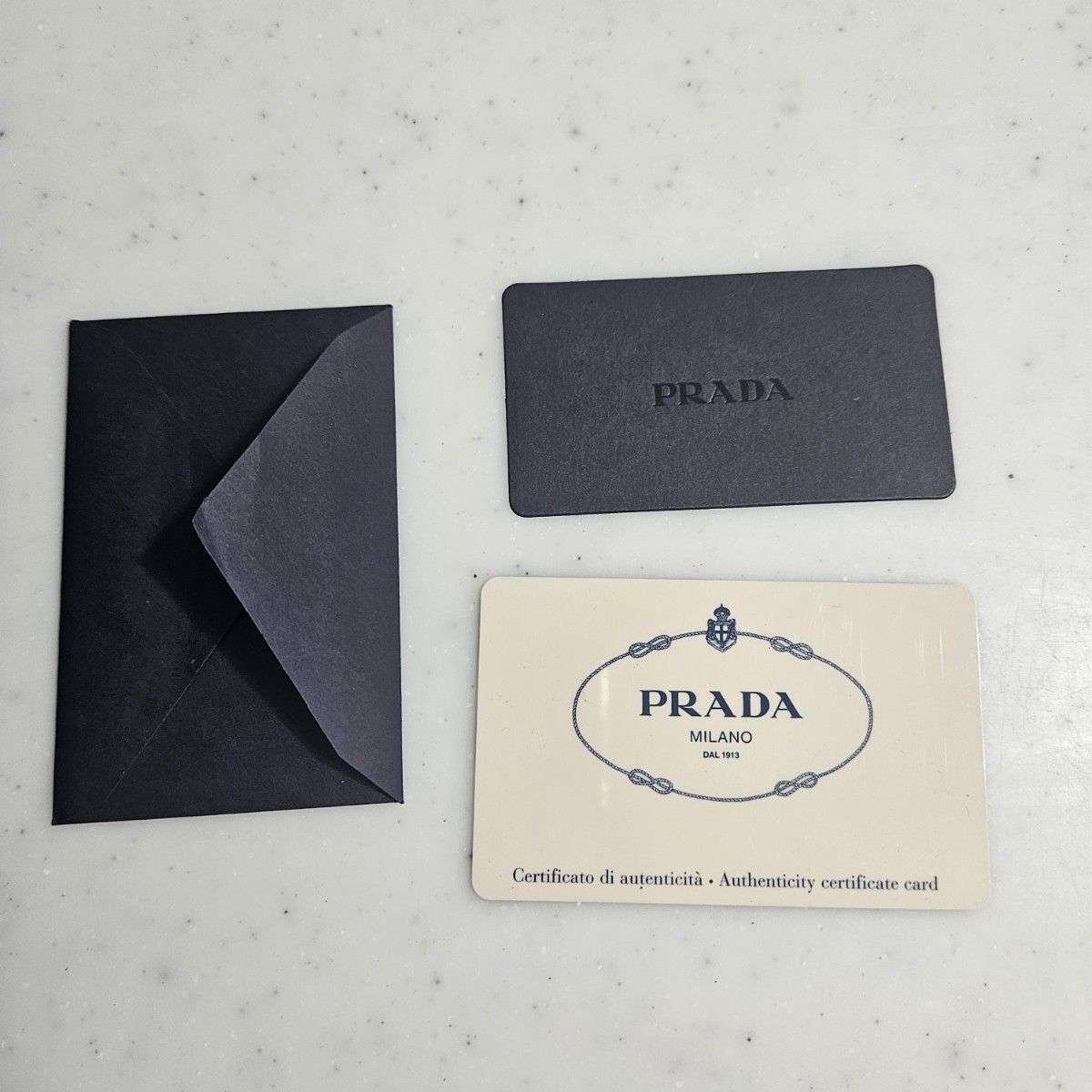 プラダ  PRADA 長財布 ナイロン　三角プレート 箱あり カード有り  補修あり
