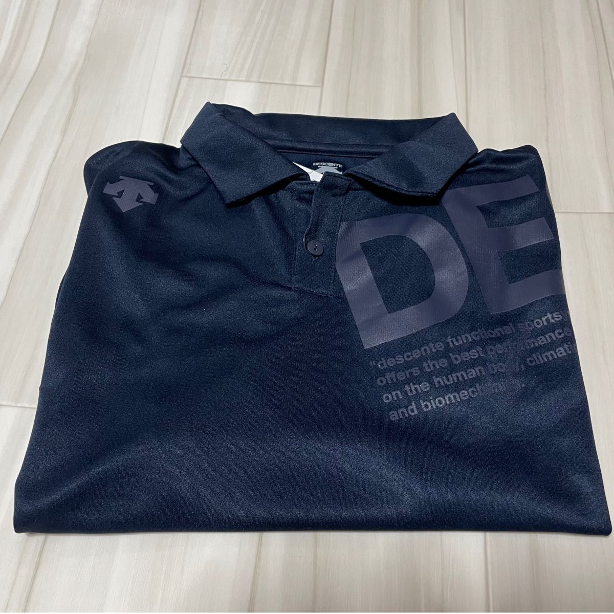 デサントDESCENTE 半袖ポロシャツ 濃紺サイズO(LL)ゴルフ、スポーツ全般に。吸水速乾 性素材、新品未使用です。