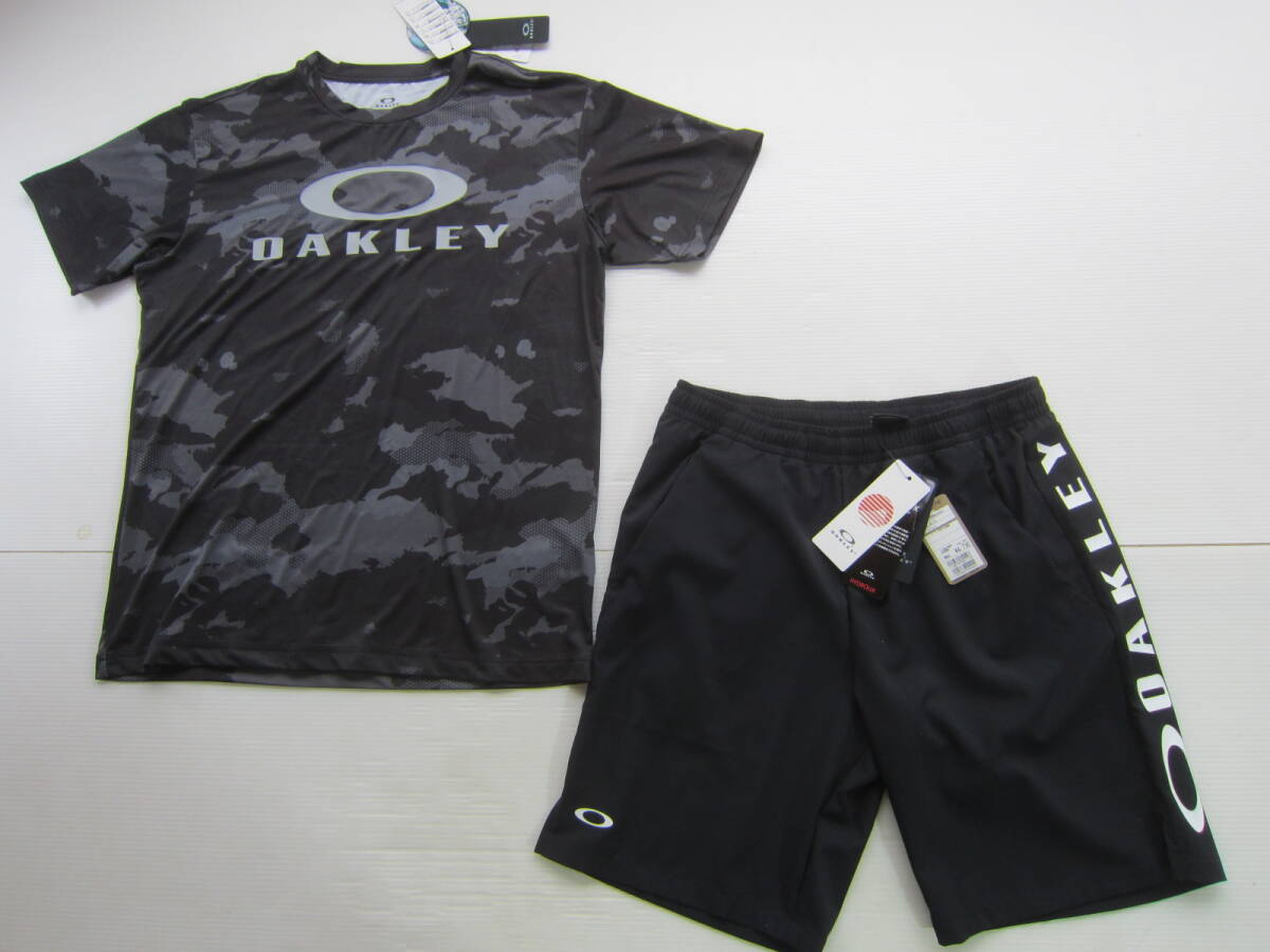 新品◆オークリーOAKLEY 半袖Tシャツ & ショート パンツ M 黒 迷彩 抗菌防臭 UVカット 吸汗速乾 4WAYストレッチ スポーツ ジョギング /L_画像1