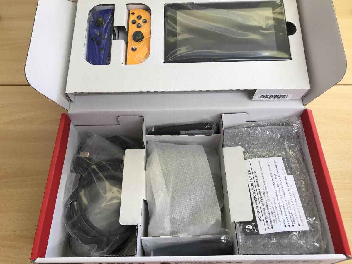 070(8-44) 1円スタート ジャンク品 Nintendo Switch ニンテンドー スイッチ 本体 新型 ブルー ネオオレンジ の画像2