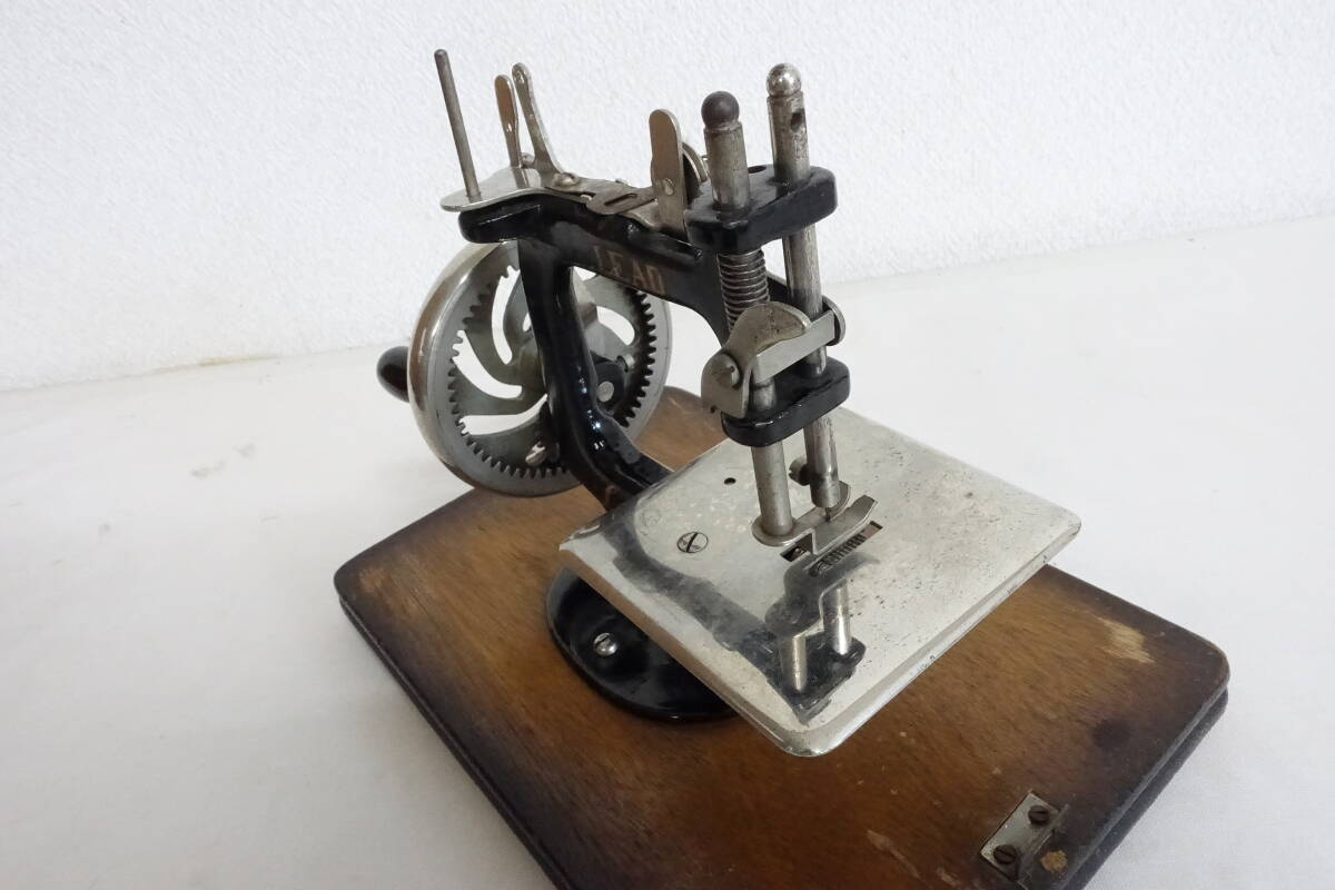 (6) antique LEAD hand turning type sewing machine 