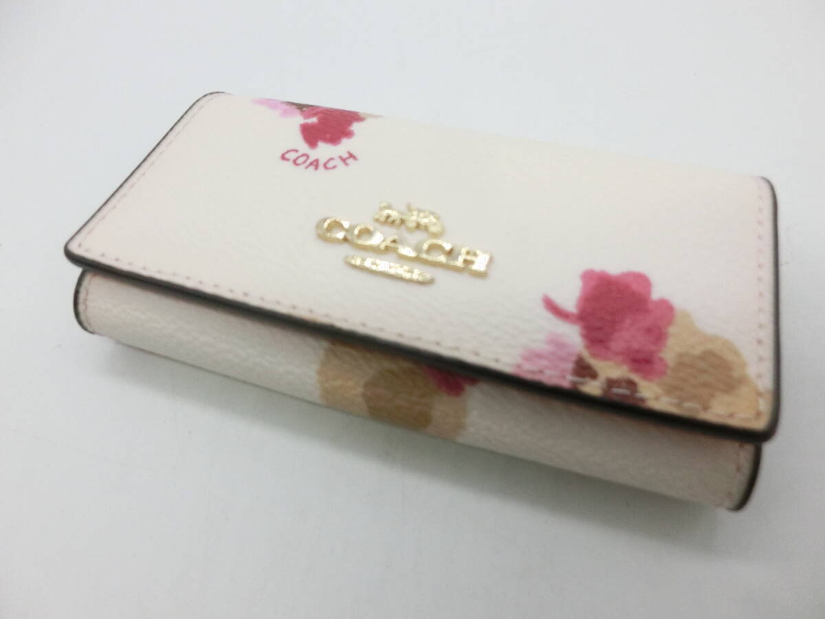 ◇COACH◇#1100 コーチ 花柄キーケース ホワイト ピンク 中古品_画像1