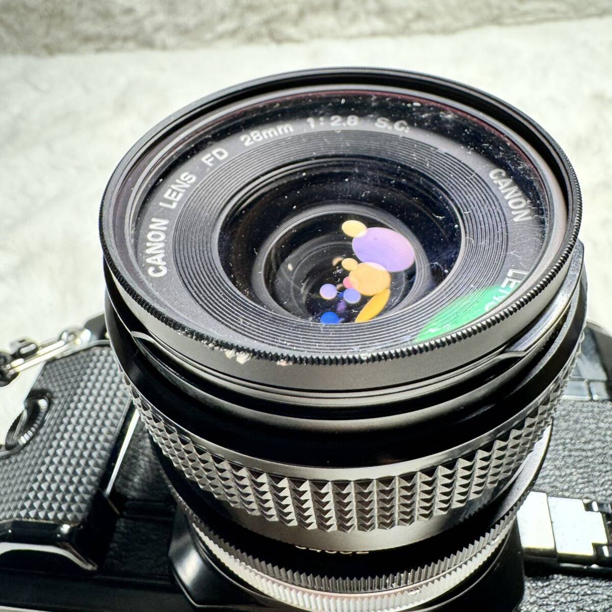 1円 Canon A-1 ボディ レンズ 28mm 1:2.8 フィルムカメラ 動作未確認の画像7