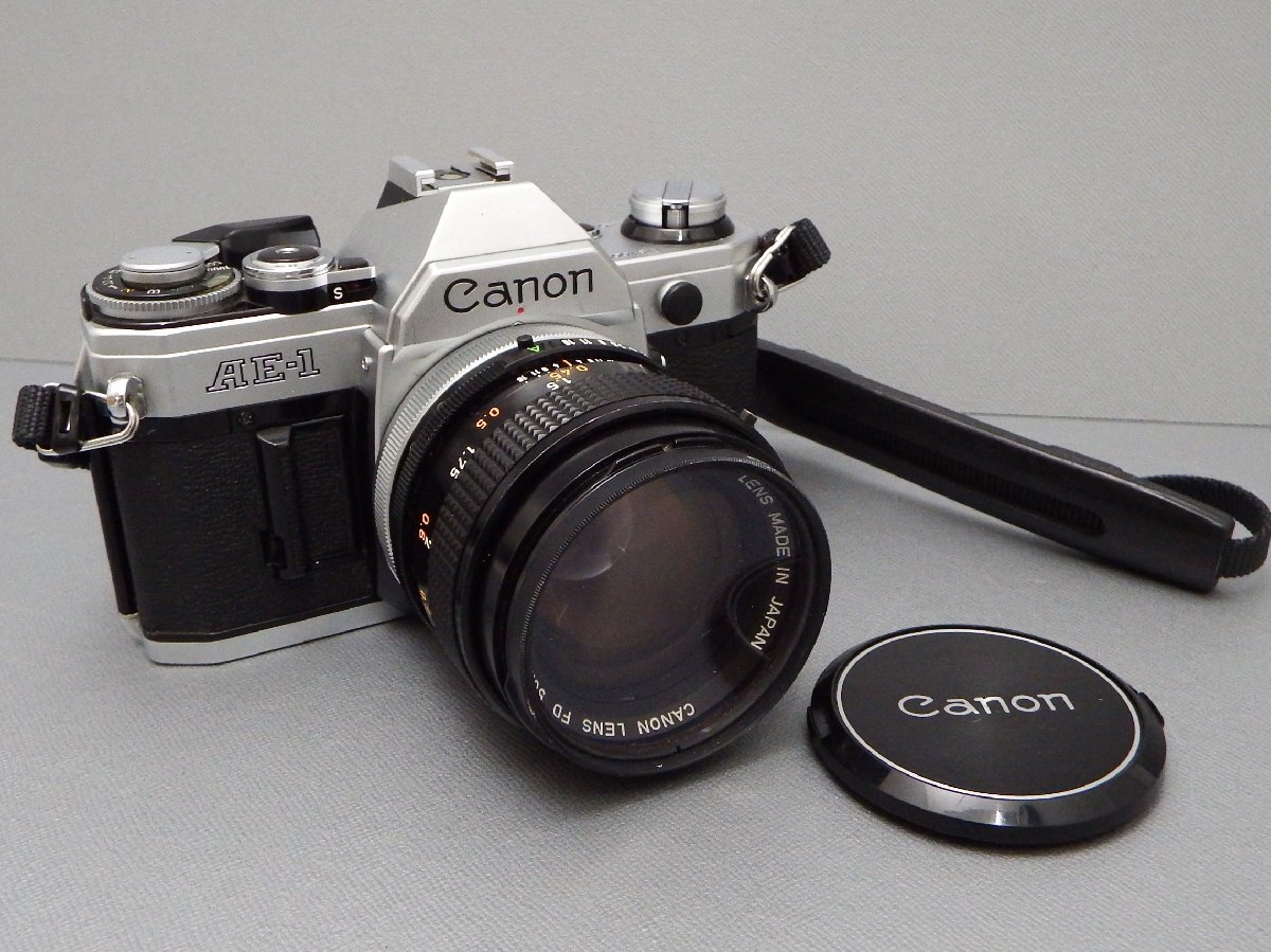 #【未チェック・ジャンク】Canon キヤノン AE-1 カメラ レンズ/FD50mm F1.4 S.S.C. フィルター/ストラップ付 現状品 一眼レフカメラ（札）_画像1