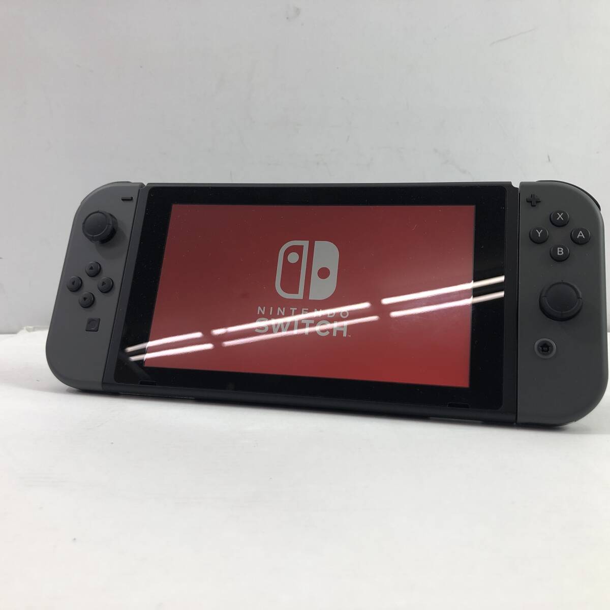 (27072)▲【1円～】Nintendo Switch 新型 グレー 本体のみ / 動作確認済み 任天堂 HAC-001(-01) 現状品_画像1