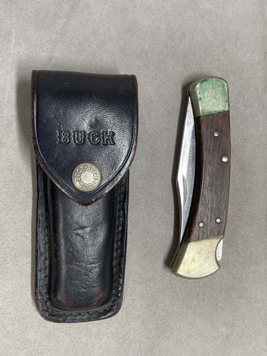 4＃H/4576　Buck Knives バック フォールディングナイフ 110 25TH ANNIVERSARY ケース付　現状/未確認　60サイズ_画像1