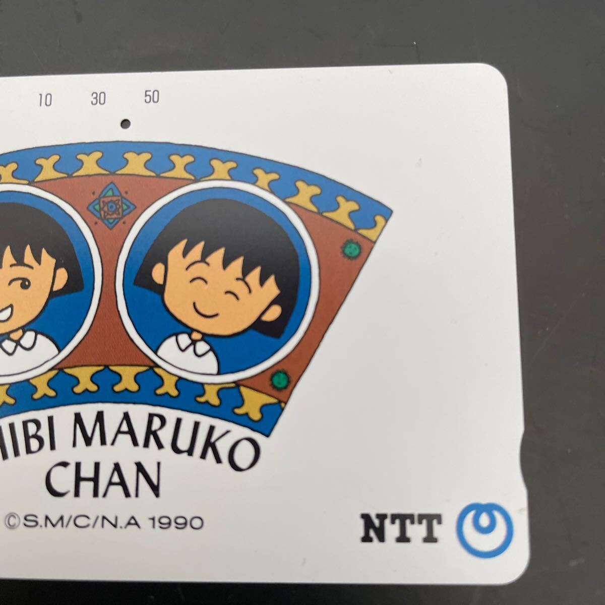 телефонная карточка Chibi Maruko-chan * телефонная карточка Chibi Maruko-chan 50 частотность (46 частотность остаток. )(1990 год 12 месяц 1 день выпуск ) *( б/у товар )