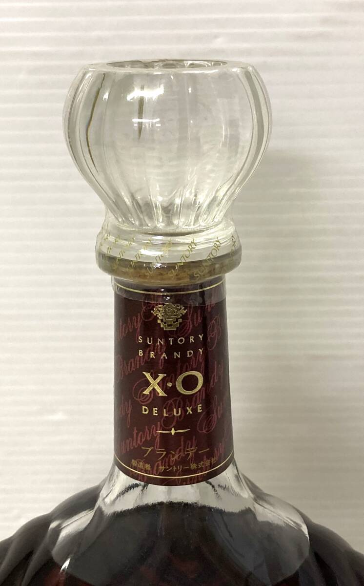 **mo not yet . plug old sake brandy Suntory Brandy X.O DELUXE Suntory brandy Deluxe **