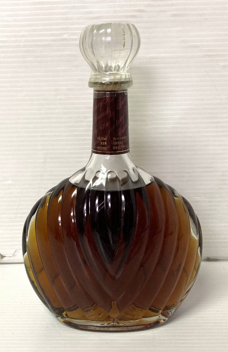 **mo not yet . plug old sake brandy Suntory Brandy X.O DELUXE Suntory brandy Deluxe **