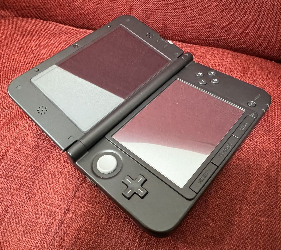 Nintendo ニンテンドー3DSLL (SPR-001) ブラック 本体＋純正品充電ACアダプタ付き 初期化済み 中古品 動作確認済みの画像2