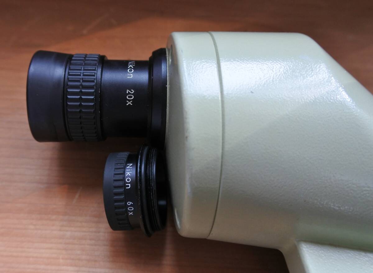  Nikon field scope, against thing lens 60mm, I piece 2 piece ( magnification 20 times +60 times )