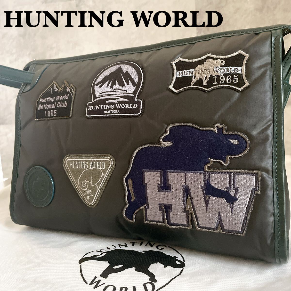  не использовался класс * HUNTING WORLD Hunting World мужской палочки .- кожа ручная сумочка сумка клатч нашивка чёрный зеленый упаковочный пакет есть 