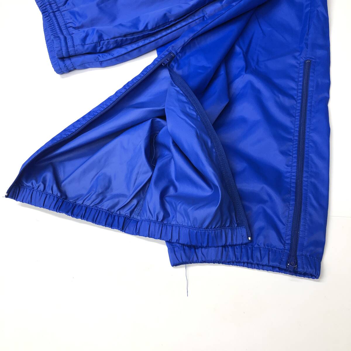 90s 銀タグ NIKE ナイキ ナイロンパンツ ブルー Sサイズ 裾 90s 銀タグ NIKE ナイキ ナイロンパンツ ブルー Sサイズ 裾