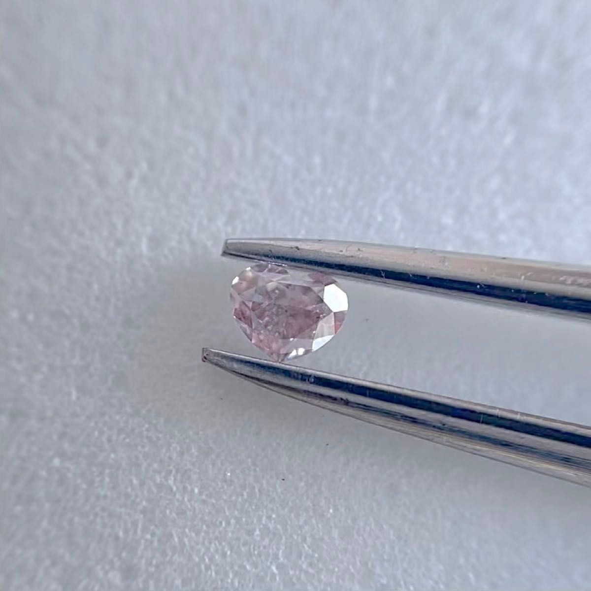 0.084ct SI-2 FANCY LIGHT PURPLISH PINK