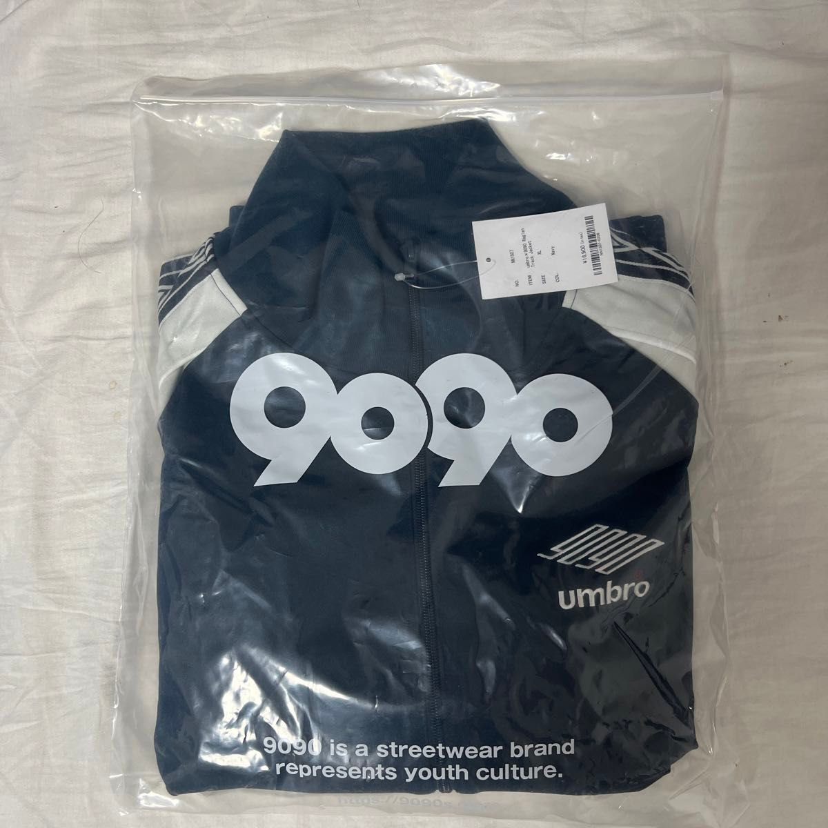 9090 × umbro Raglan Track Jacket アンブロ コラボ ナイロン 9090 × umbro Raglan Track Jacket アンブロ コラボ ナイロン