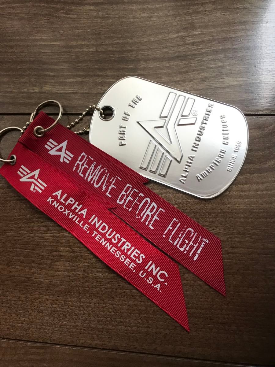 アルファインダストリーズ 赤リボン 赤タグ ALPHA INDUSTRIES アルファインダストリーズ 赤リボン 赤タグ ALPHA INDUSTRIES