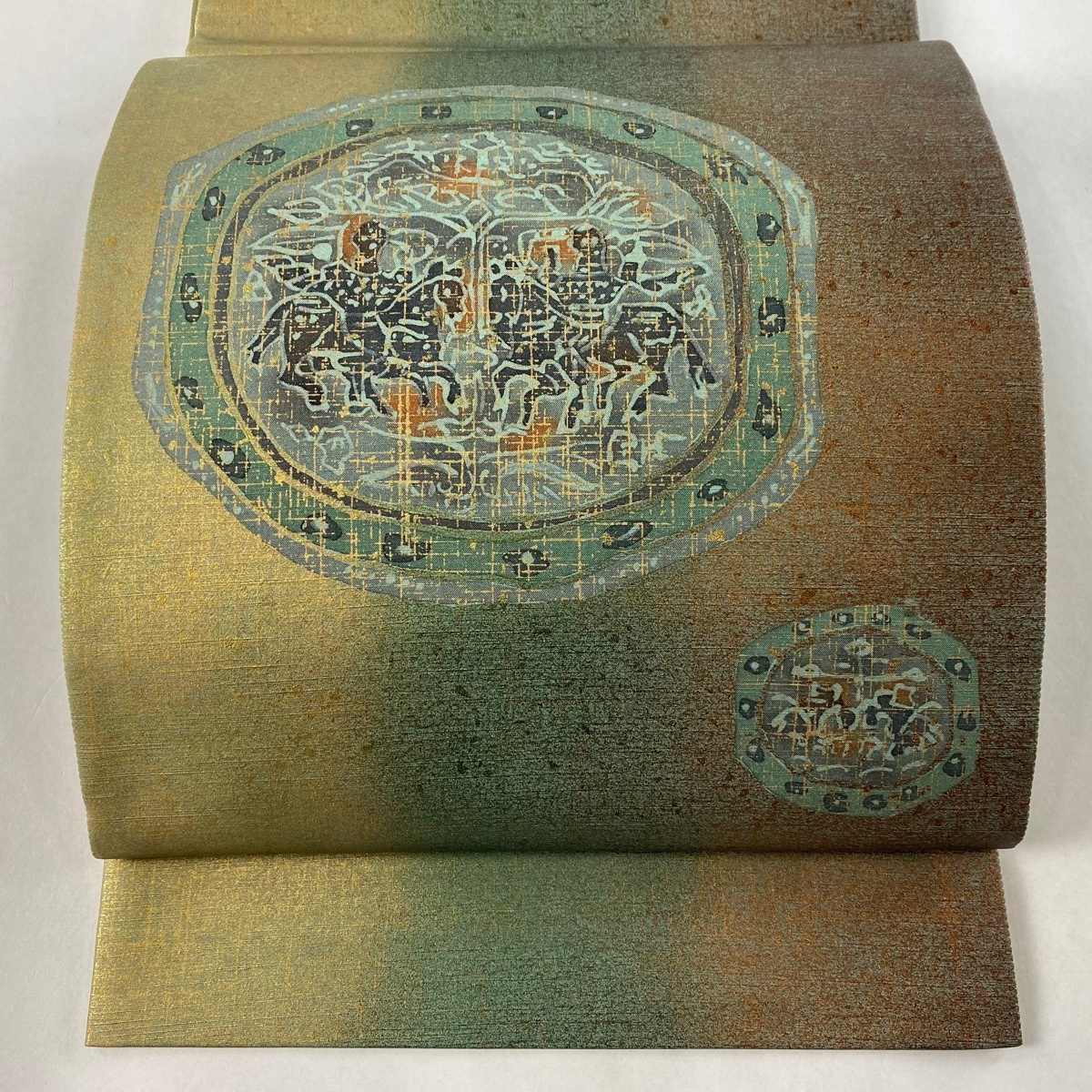 袋帯 美品 名品 証紙 大島紬 樹下鳥獣 幾何学 金彩 薄緑 お太鼓柄 正絹 【中古】