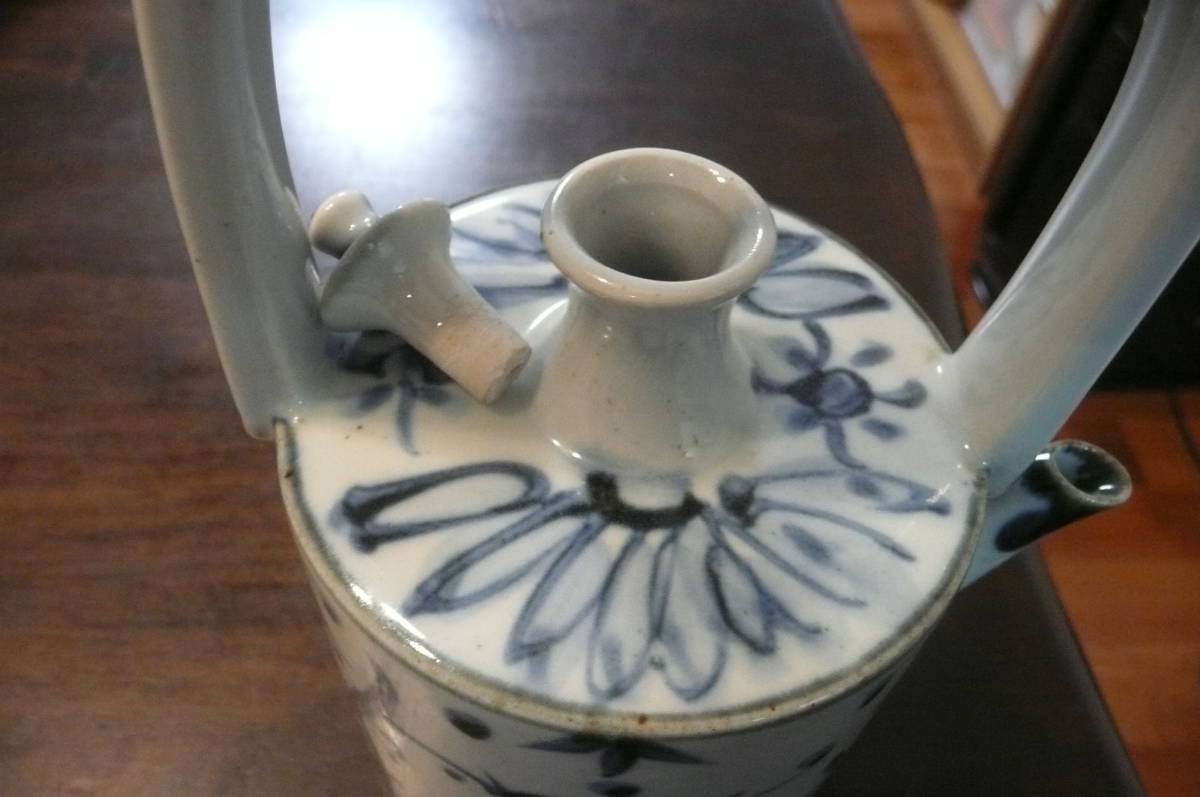 * antique ceramics made pitcher *