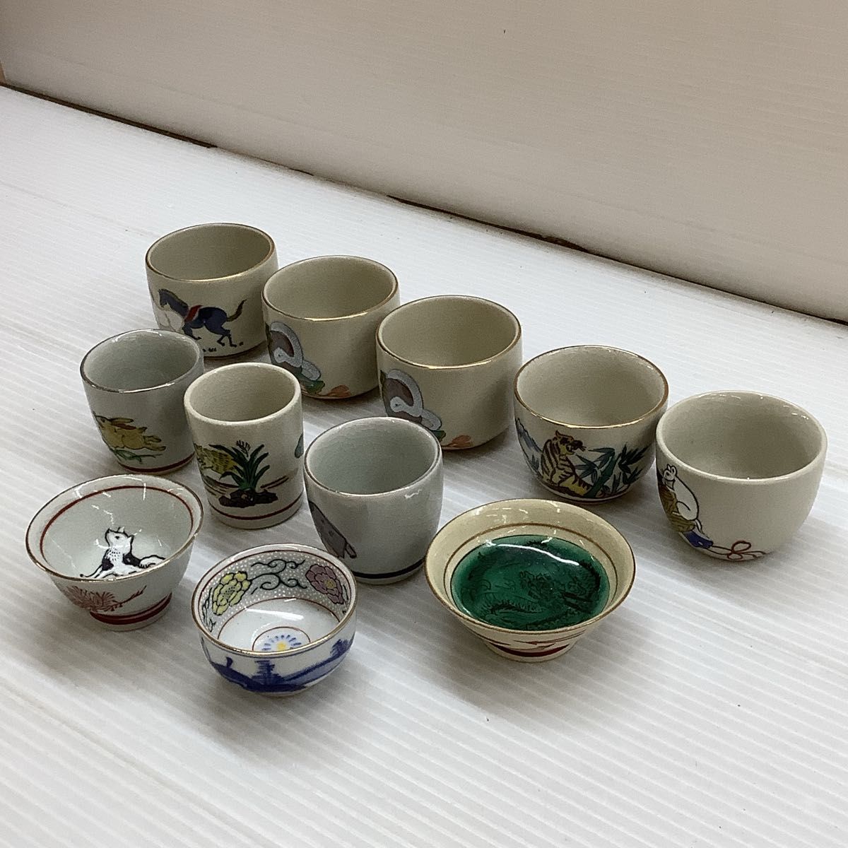 E 九谷焼 お猪口 盃 陶器 酒器 ぐい呑 干支 11個 まとめ売り E 九谷焼 お猪口 盃 陶器 酒器 ぐい呑 干支 11個 まとめ売り