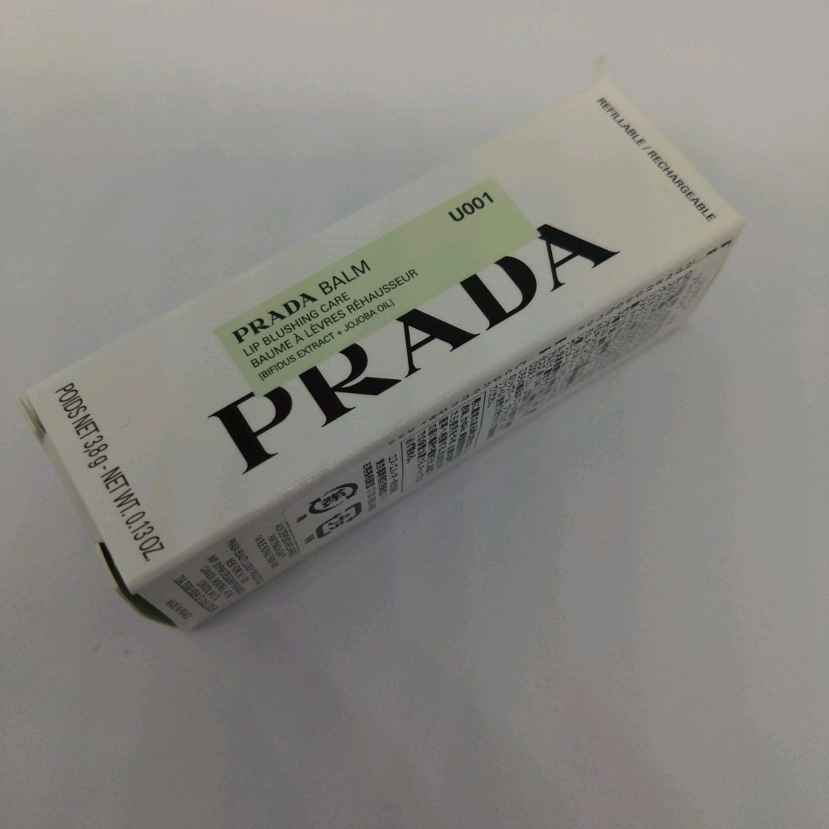 新品】PRADA リップバーム ブラッシングケア U001 アストラル 新品】PRADA リップバーム ブラッシングケア U001 アストラル