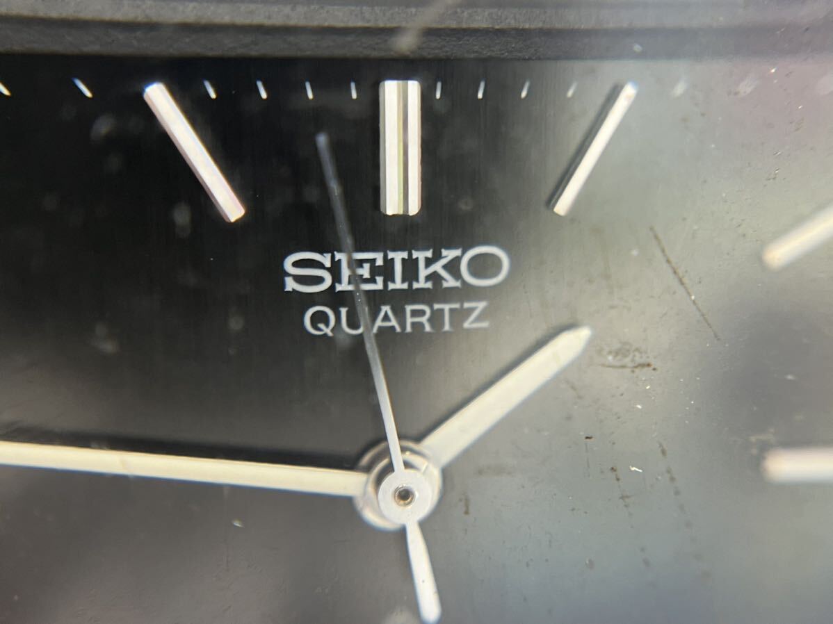 い SEIKO セイコー QUARTZ クォーツ 腕時計 H557-510 A 黒文字盤