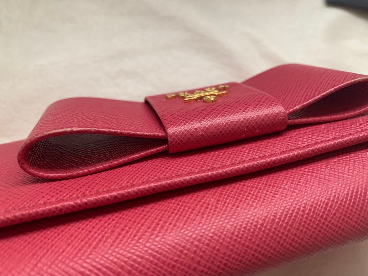 正規品】PRADA プラダ サフィアーノ 二つ折り長財布 リボン 正規品】PRADA プラダ サフィアーノ 二つ折り長財布 リボン