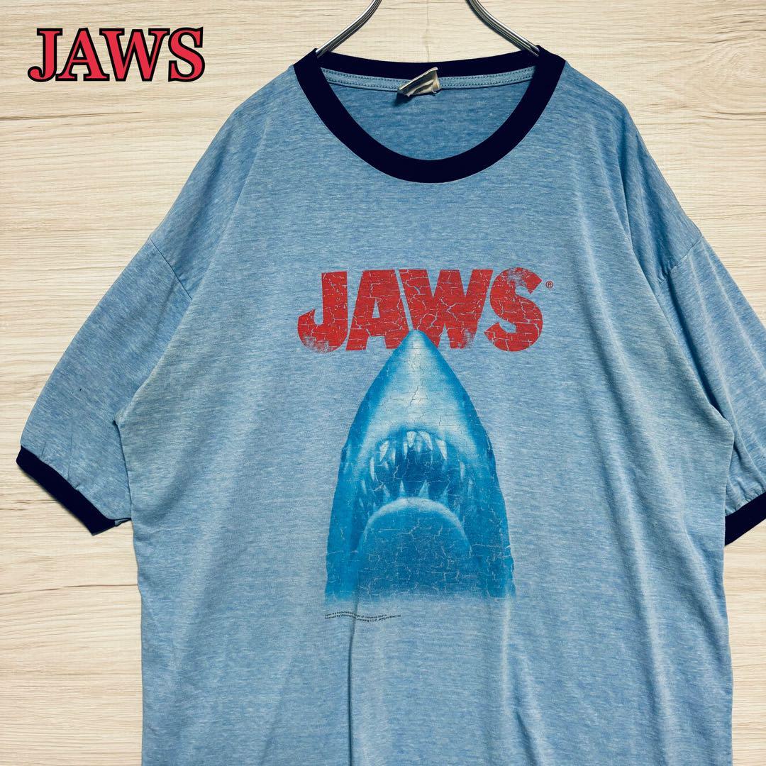 【入手困難】JAWS ジョーズ Tシャツ リンガー ヴィンテージ ユニバーサルスタジオ ビッグプリント ムービー 映画 サメ ゆったり 【入手困難】JAWS ジョーズ Tシャツ リンガー ヴィンテージ ユニバーサルスタジオ ビッグプリント ムービー 映画 サメ ゆったり