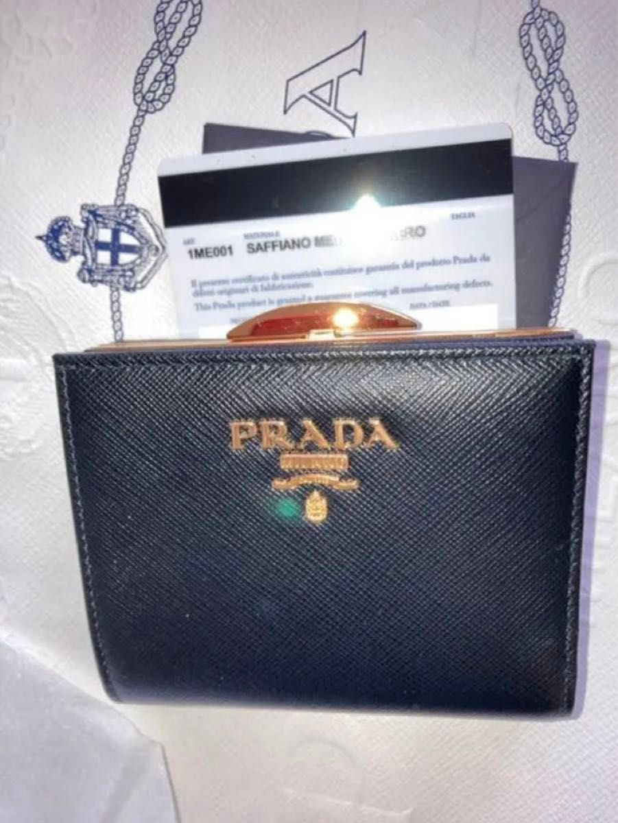 新品 PRADA・プラダ がま口 コンパクト 折りたたみ/折財布 黒 新品 PRADA・プラダ がま口 コンパクト 折りたたみ/折財布 黒