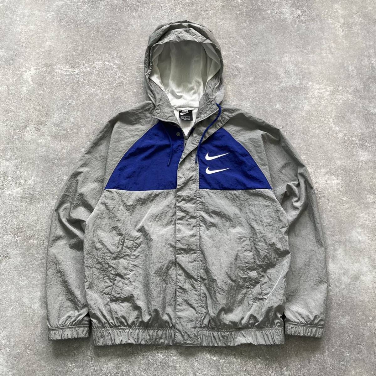 NIKE / ナイキ】 ウーブンナイロンジャケット ダブルスウッシュ NIKE / ナイキ】 ウーブンナイロンジャケット ダブルスウッシュ