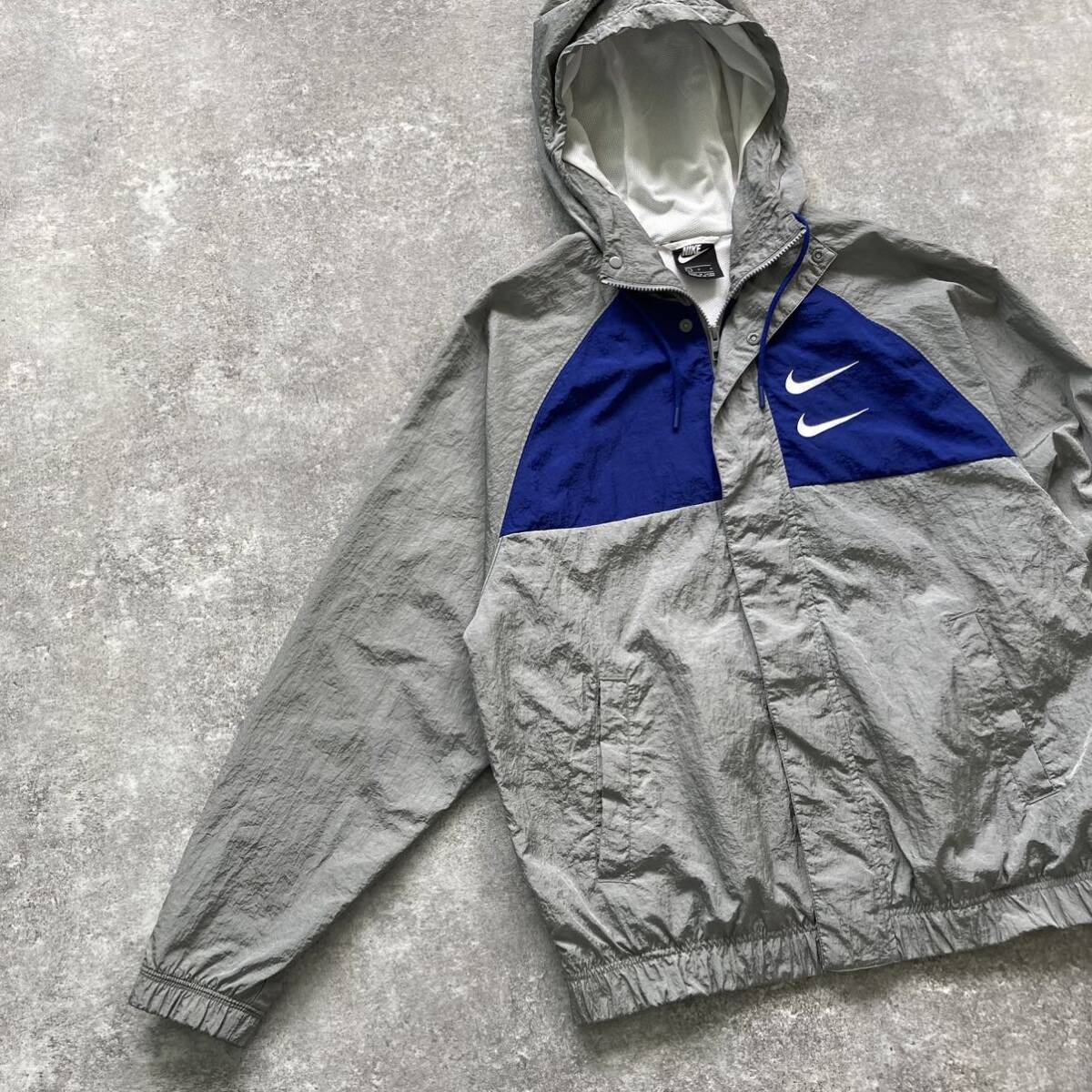NIKE / ナイキ】 ウーブンナイロンジャケット ダブルスウッシュ NIKE / ナイキ】 ウーブンナイロンジャケット ダブルスウッシュ