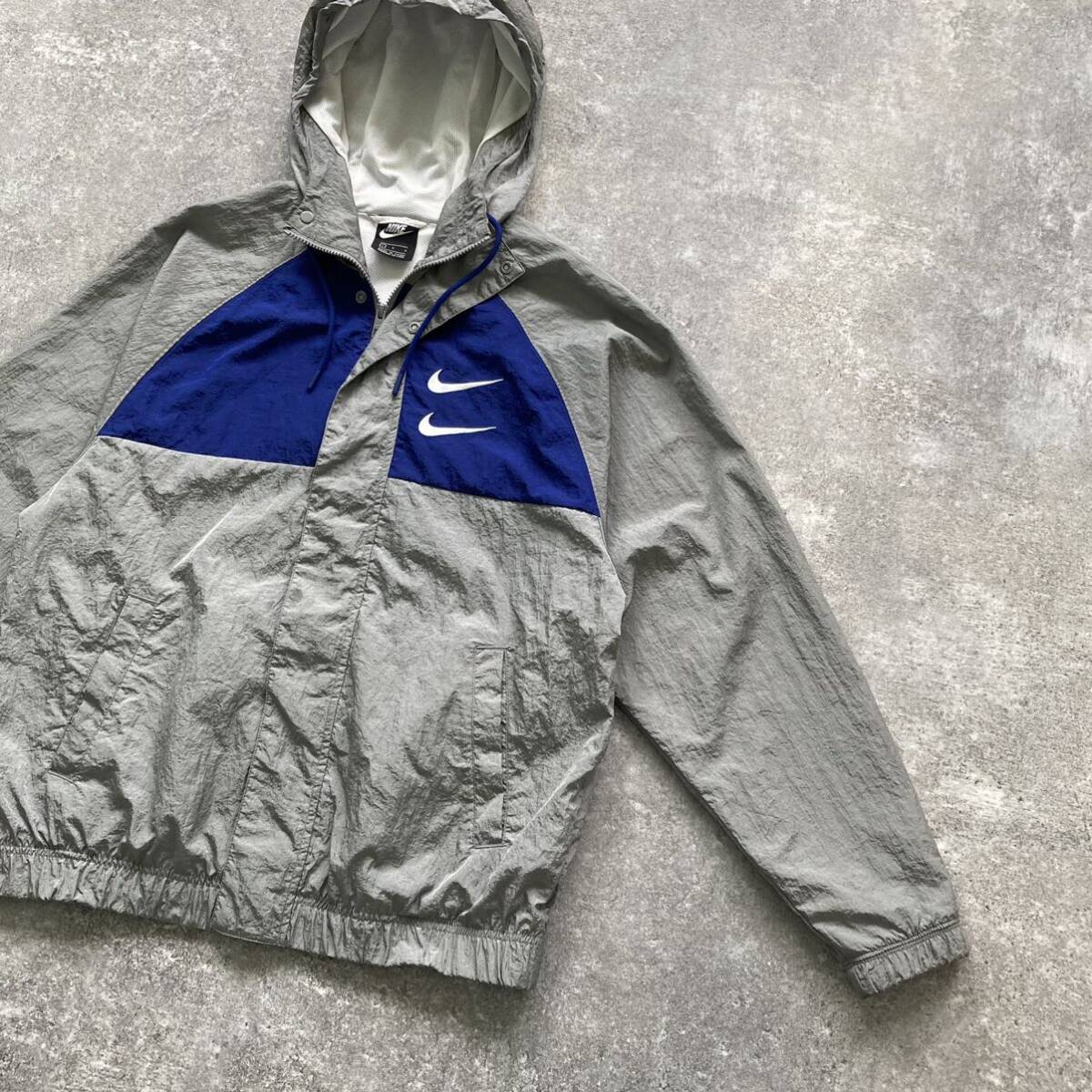NIKE / ナイキ】 ウーブンナイロンジャケット ダブルスウッシュ NIKE / ナイキ】 ウーブンナイロンジャケット ダブルスウッシュ