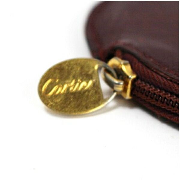 ★ カルティエ マスト ドゥ カルティエ コインケース 小銭入れ 丸型 レザー ボルドー 中古 Bランク CARTIER｜