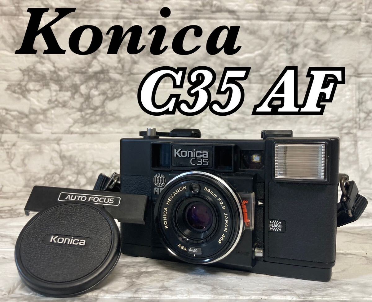 動作確認済 現状品】KONICA コニカ C35 AF コンパクトフィルムカメラ ジャスピンコニカ MADE IN JAPAN 日本製 レンズカバー  外観美品(コンパクトカメラ)｜売買されたオークション情報、Yahoo!オークション(旧ヤフオク!) の商品情報をアーカイブ公開 - オークファン ...