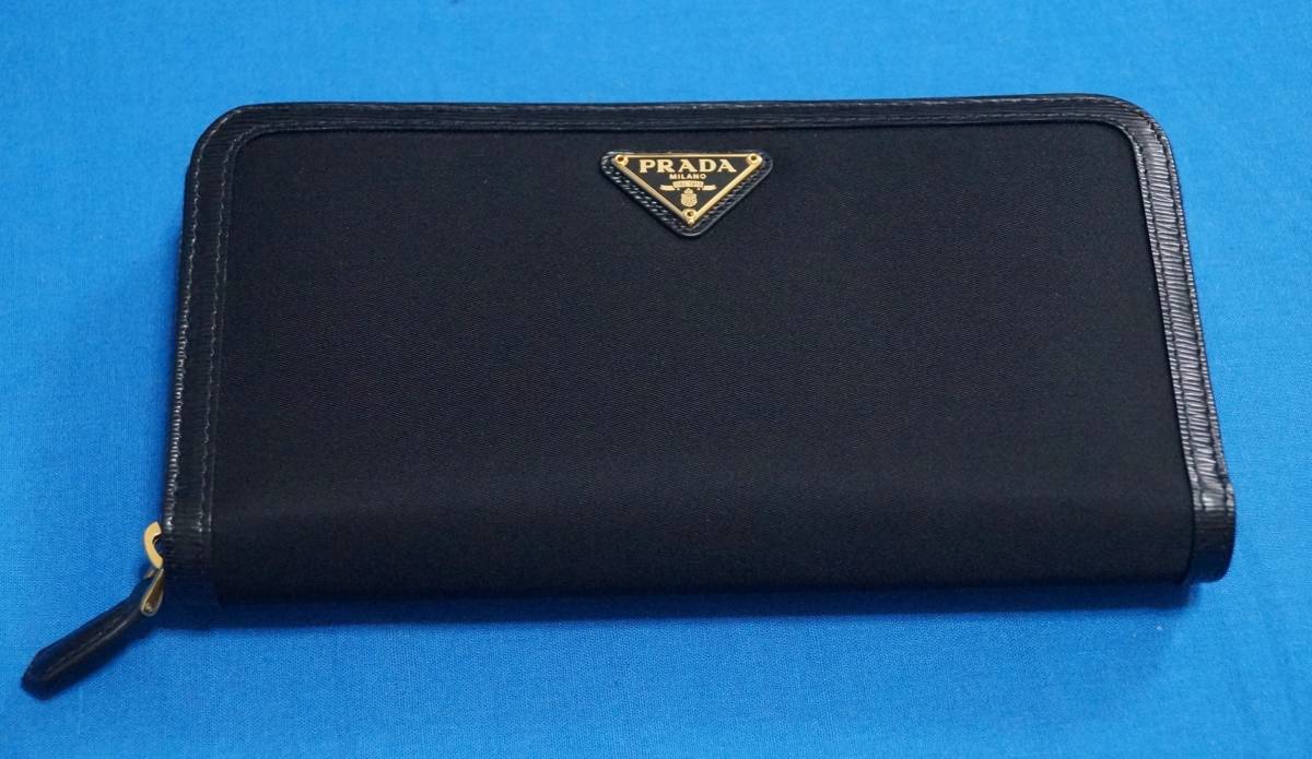 【予約】 ■未使用品■PRADA ジッパー長財布 純正箱・ギャランティカード 女性用財布