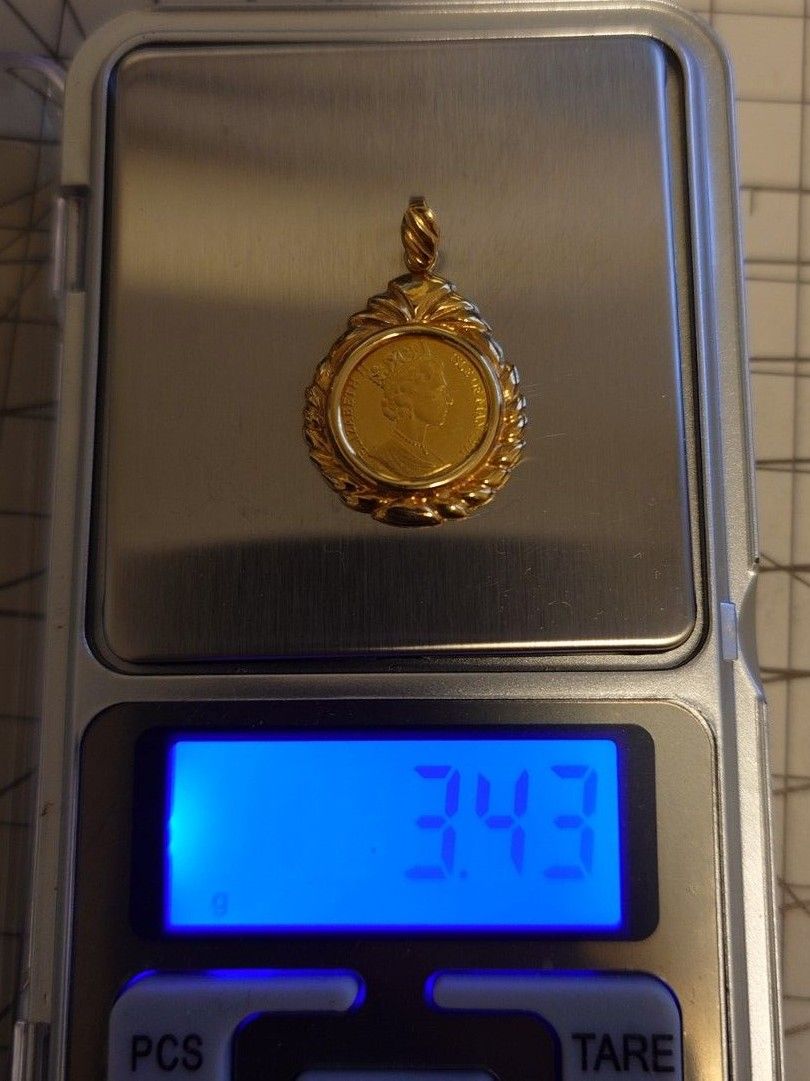 マン島 1991年 キャット金貨エリザベス K24純金1/25oz 枠k18 マン島 1991年 キャット金貨エリザベス K24純金1/25oz 枠k18