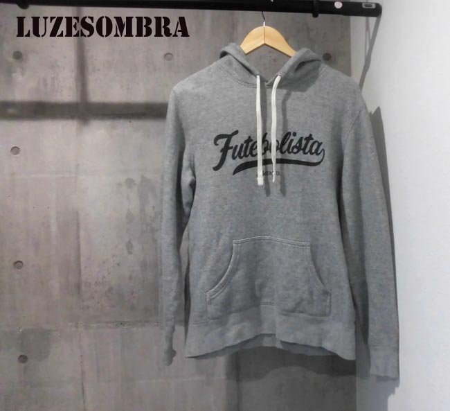 LUZeSOMBRA ルースイソンブラ ロゴプリント スウェット パーカー M/プルオーバー フーディ/灰 グレー/メンズ/サッカー フットサル