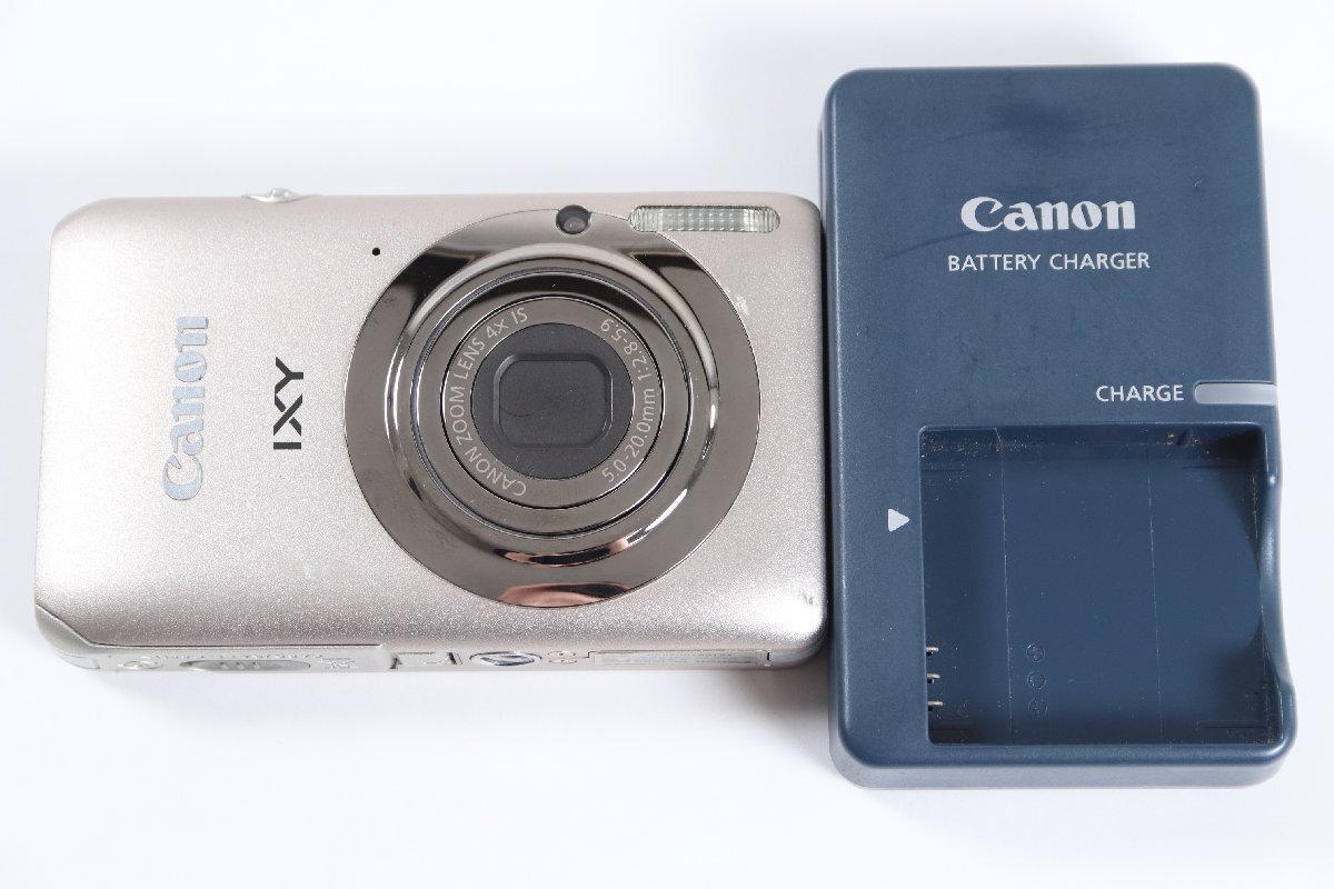 ジャンク 故障品 Canon IXY コンパクトデジタルカメラ 本体と充電器 Canon IXY シルバー デジタルカメラ 本体と充電器付き(Amazon