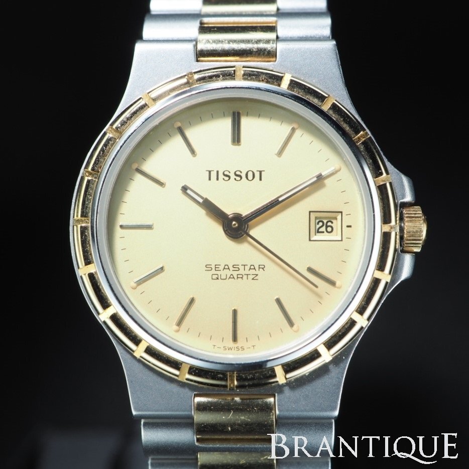 ■1円~■ TISSOT ティソ GP/SS QZ シャンパンカラー コンビカラー デイト 文字盤 USED 稼働品 保証書 巾着 レディース 腕時計 「25056」