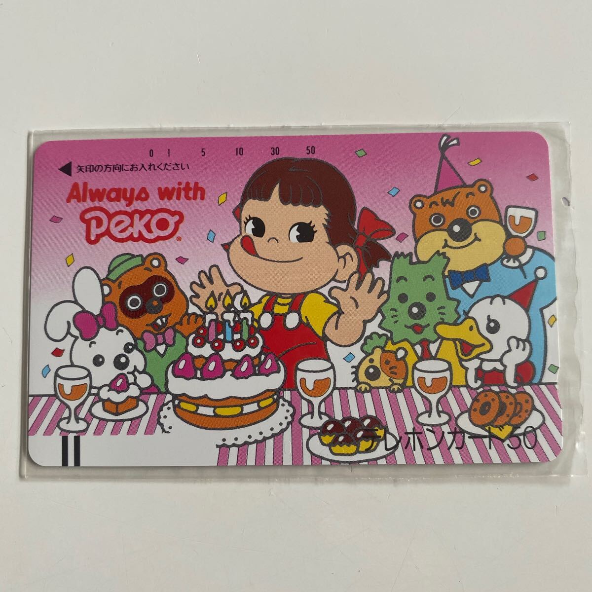 テレホンカード　ペコちゃん　ポコちゃん　不二家　テレカ_画像1