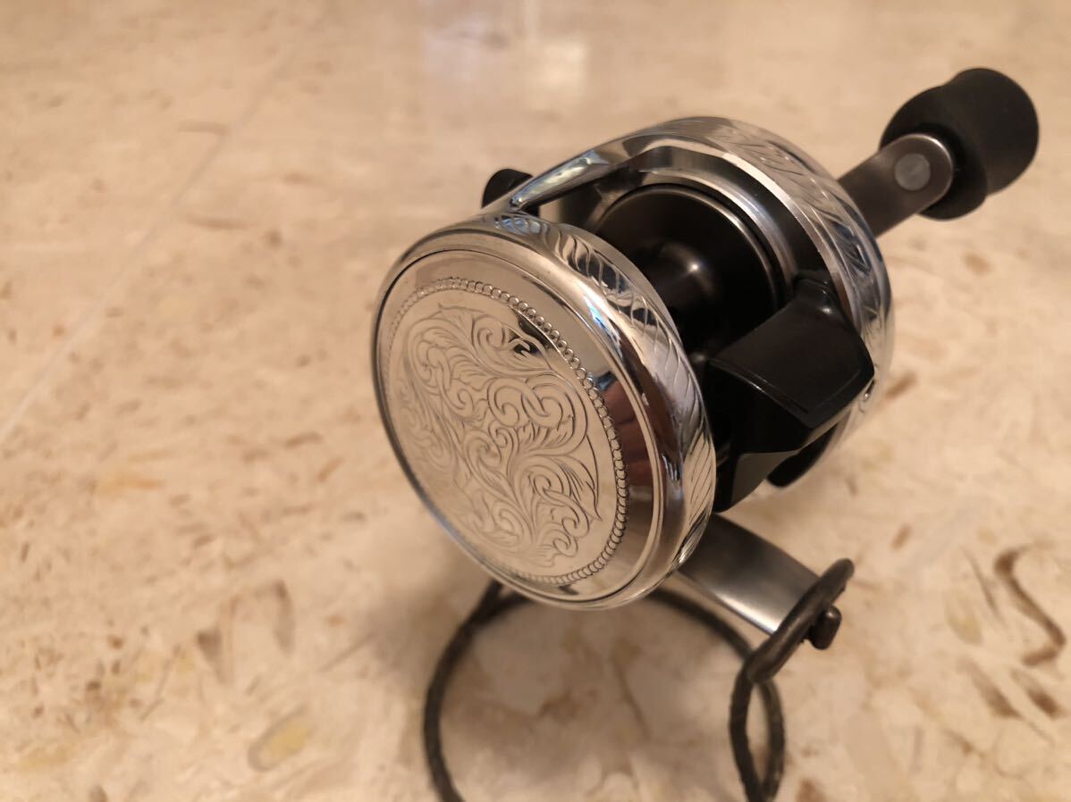 シマノ 12カルカッタ100 カスタム SHIMANO 彫金カスタム 送料 シマノ 12カルカッタ100 カスタム SHIMANO 彫金カスタム 送料
