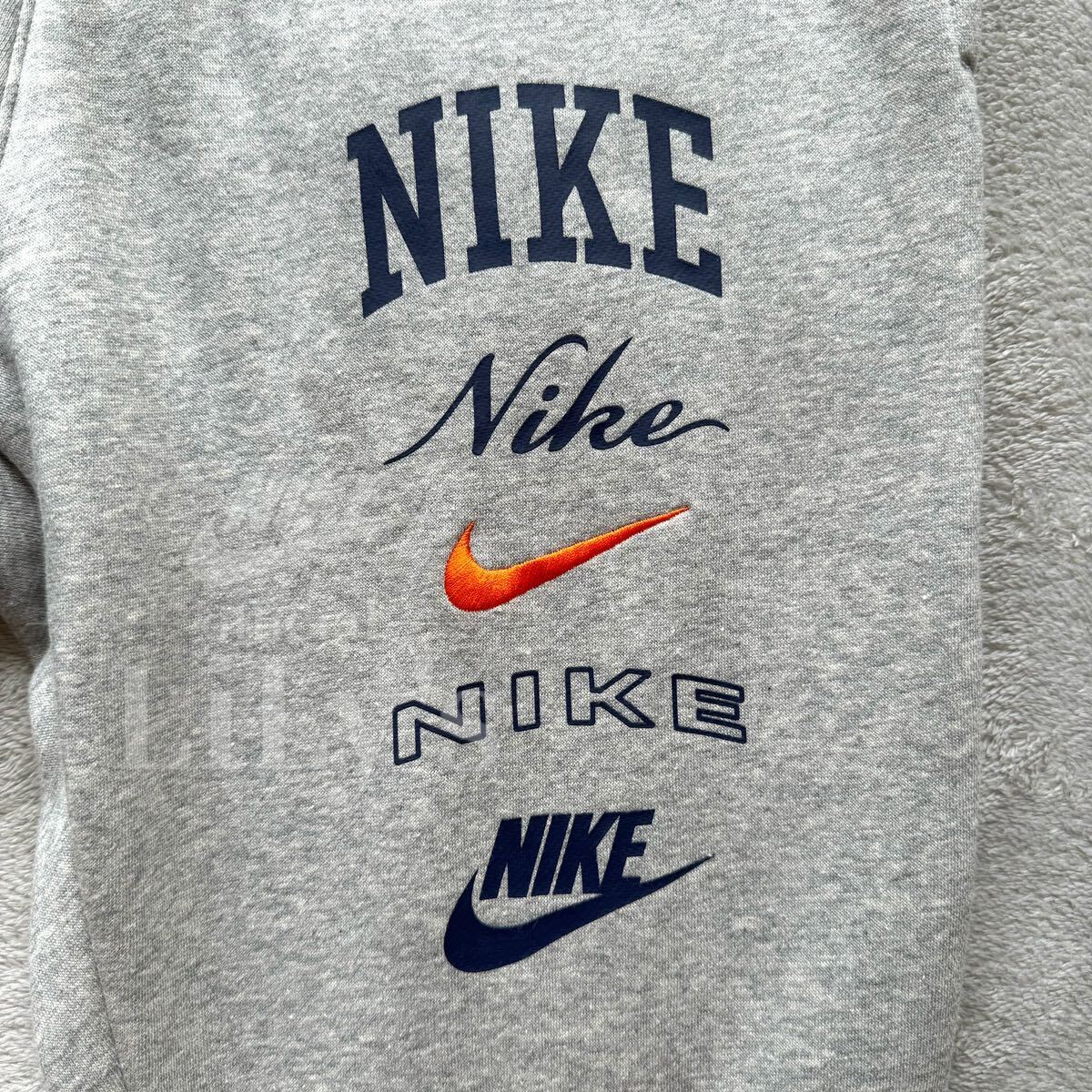 新品 NIKE上下セットアップ M グレーオレンジ ナイキ 送料無料 新品 NIKE上下セットアップ M グレーオレンジ ナイキ 送料無料